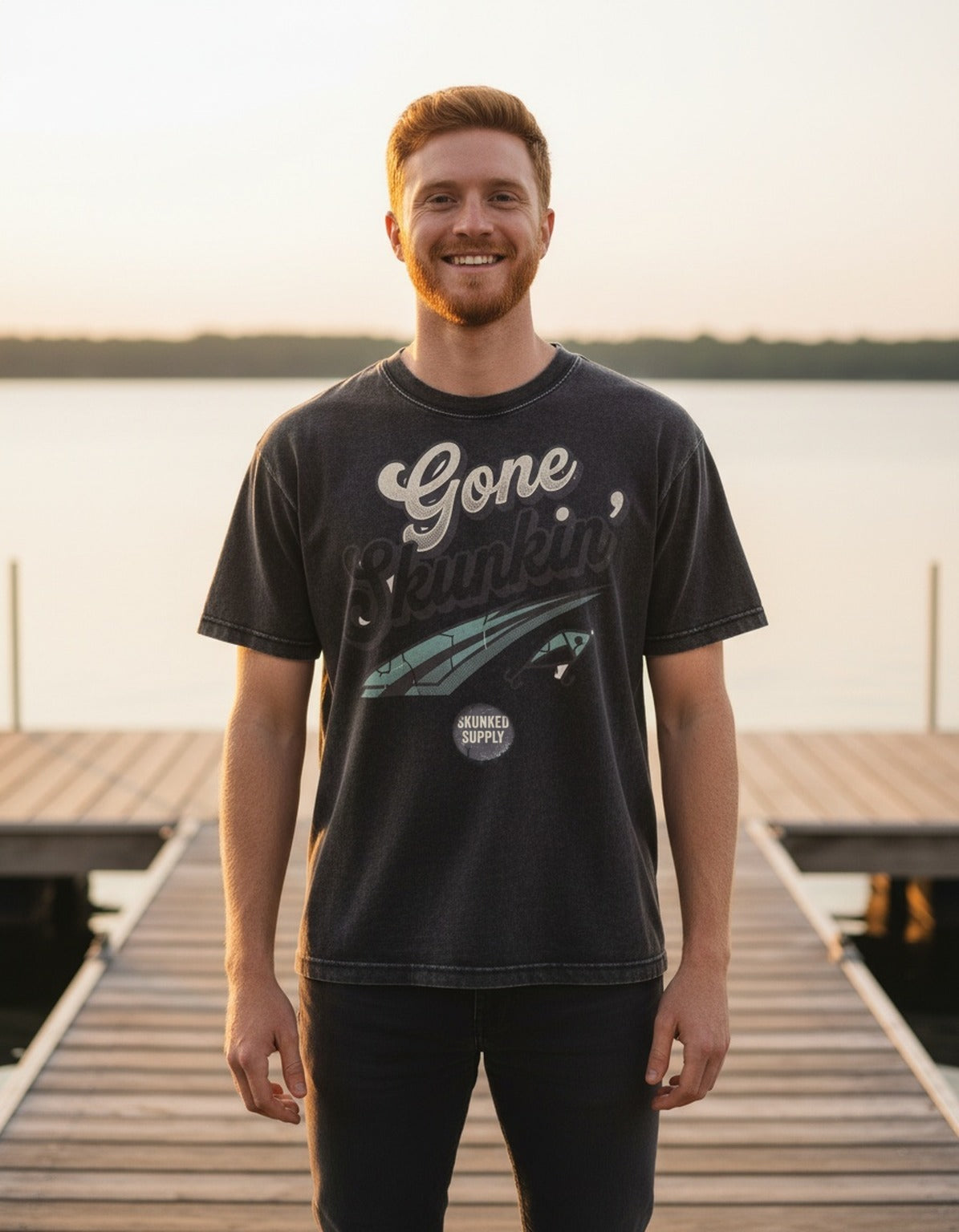 Gone Skunkin' tee worn by an angler at the lake