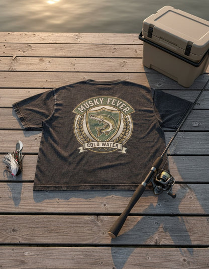 Musky Fever tee on the dock with fishing gear
