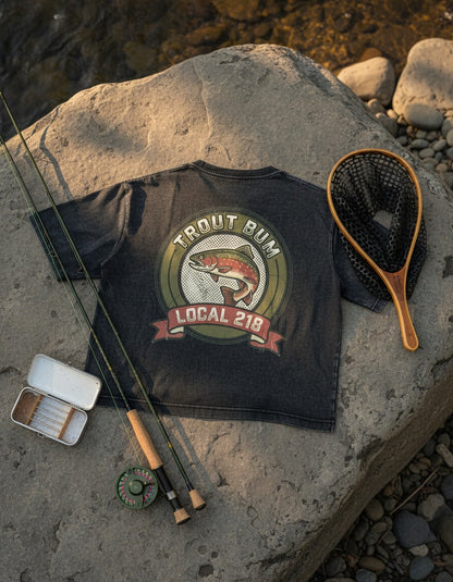 Trout Bum Local 218 tee on the dock with fishing gear